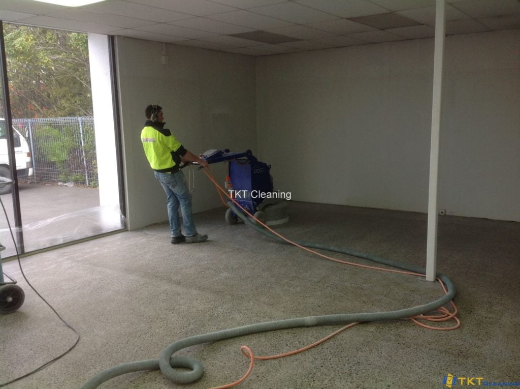 The concrete floor grinding service in the rough grinding stage
